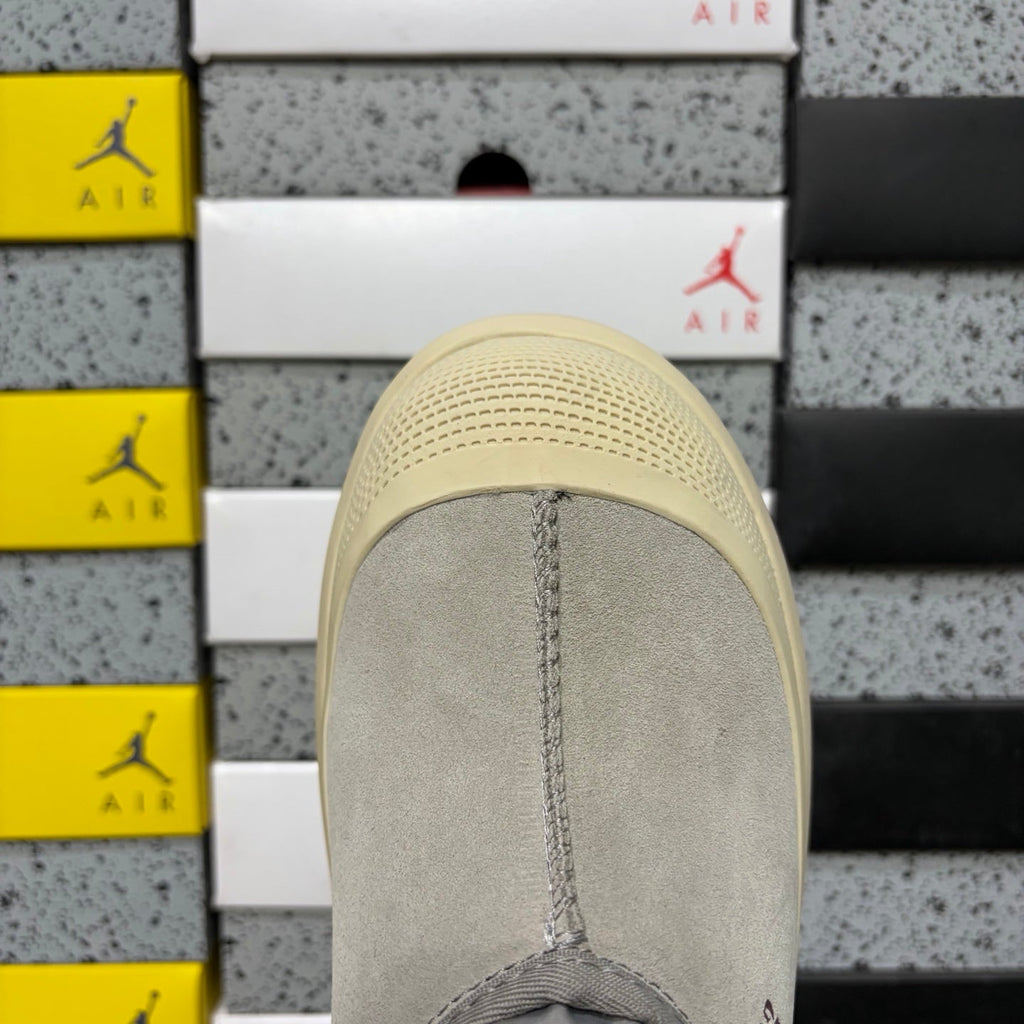 UGG Neumeel Deco Slip-On – Suede Moccasin Sneaker with Cream Lug Sole & Reflective Drawstring in Grey