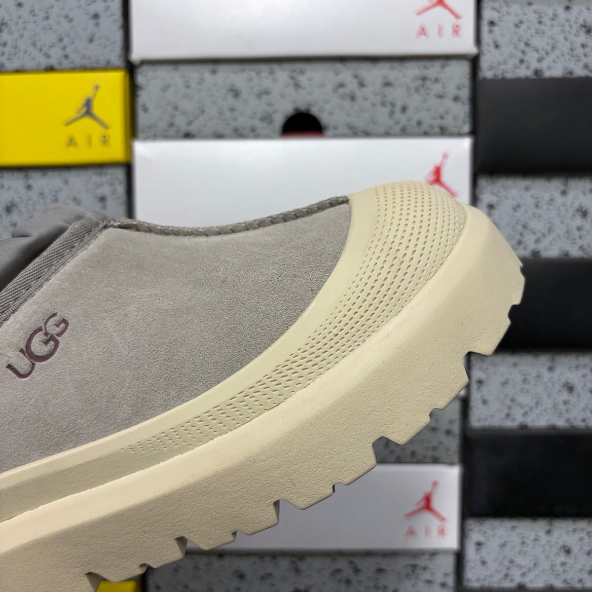 UGG Neumeel Deco Slip-On – Suede Moccasin Sneaker with Cream Lug Sole & Reflective Drawstring in Grey